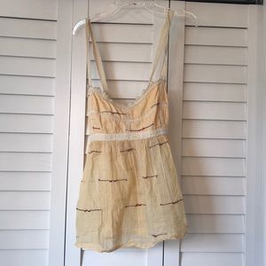 Yellow tank top with detailing